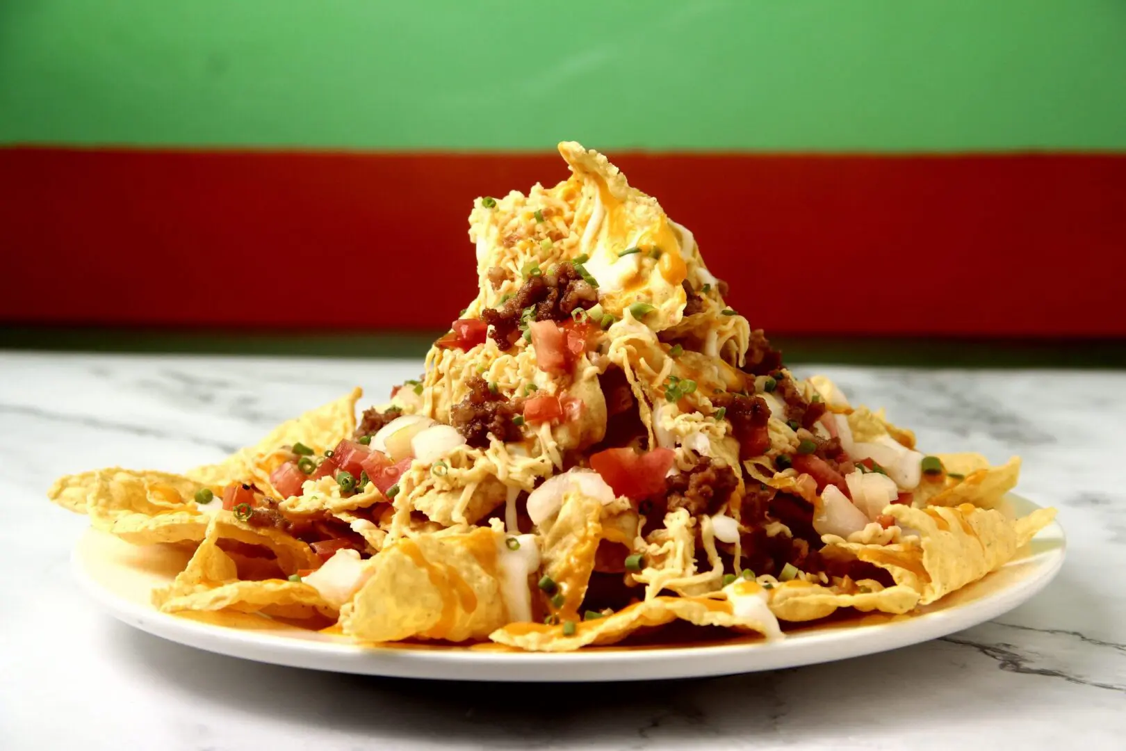 Loaded nachos with cheese, meat, and salsa