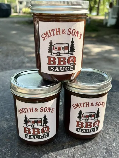 Trio of BBQ sauce jars displayed