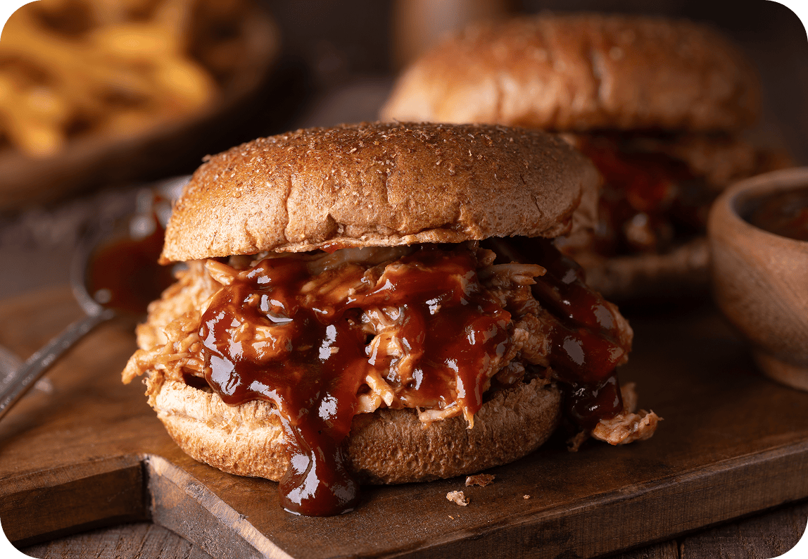 Savory pulled pork burger with barbecue sauce