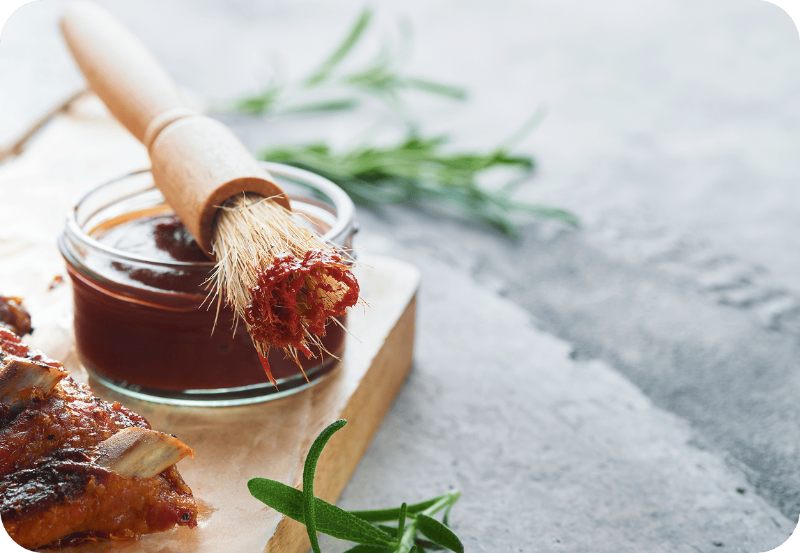 BBQ sauce and brush with herbs