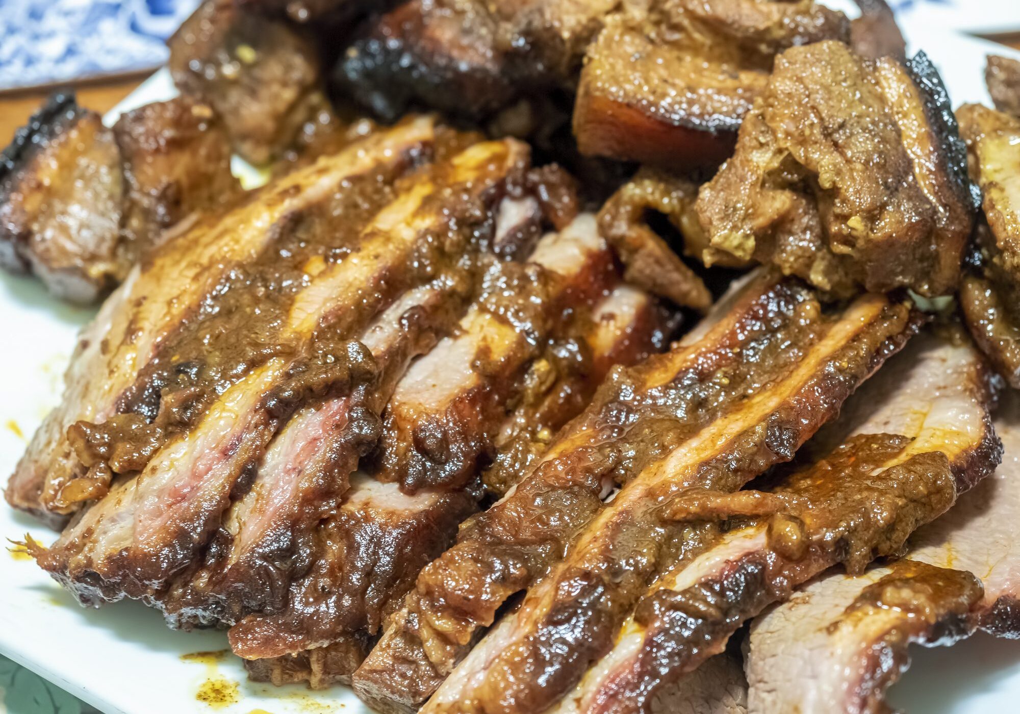 Sliced glazed ribs on a plate