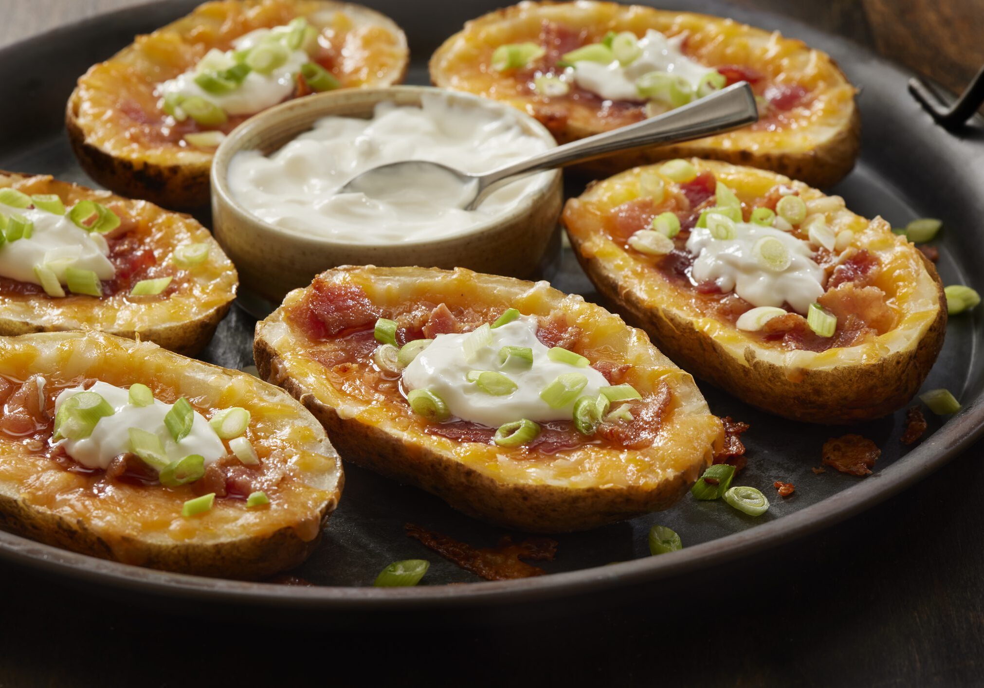 Loaded potato skins with bacon and sour cream