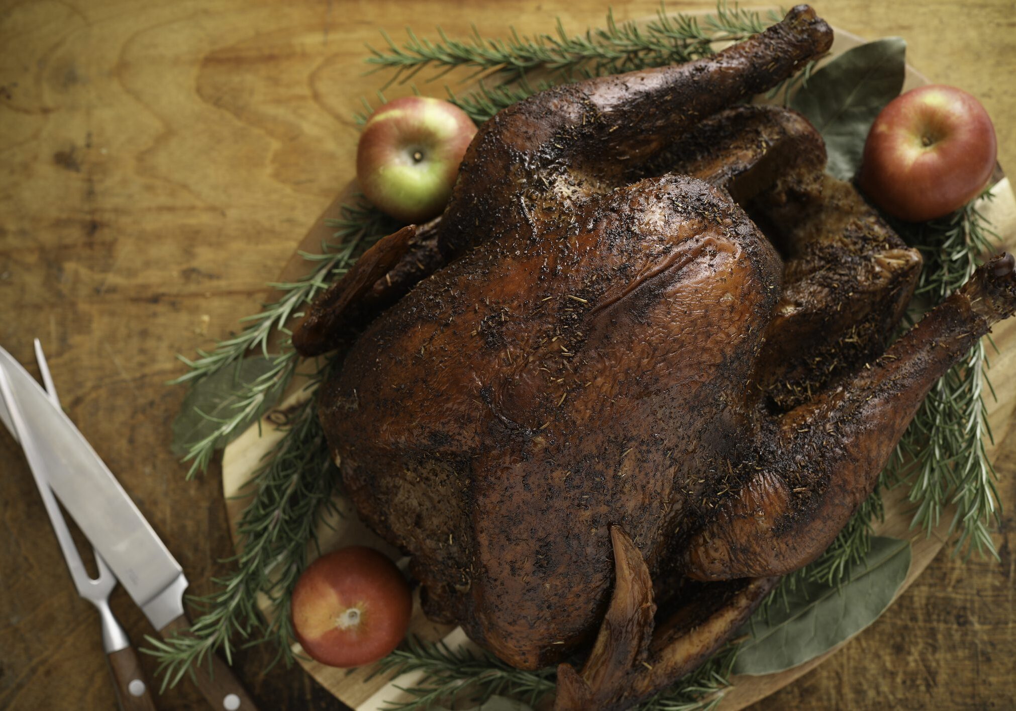 Roasted whole turkey with rosemary and apples